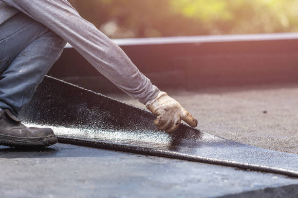 Professional Basement Waterproofing technician working in Hales Corners, WI